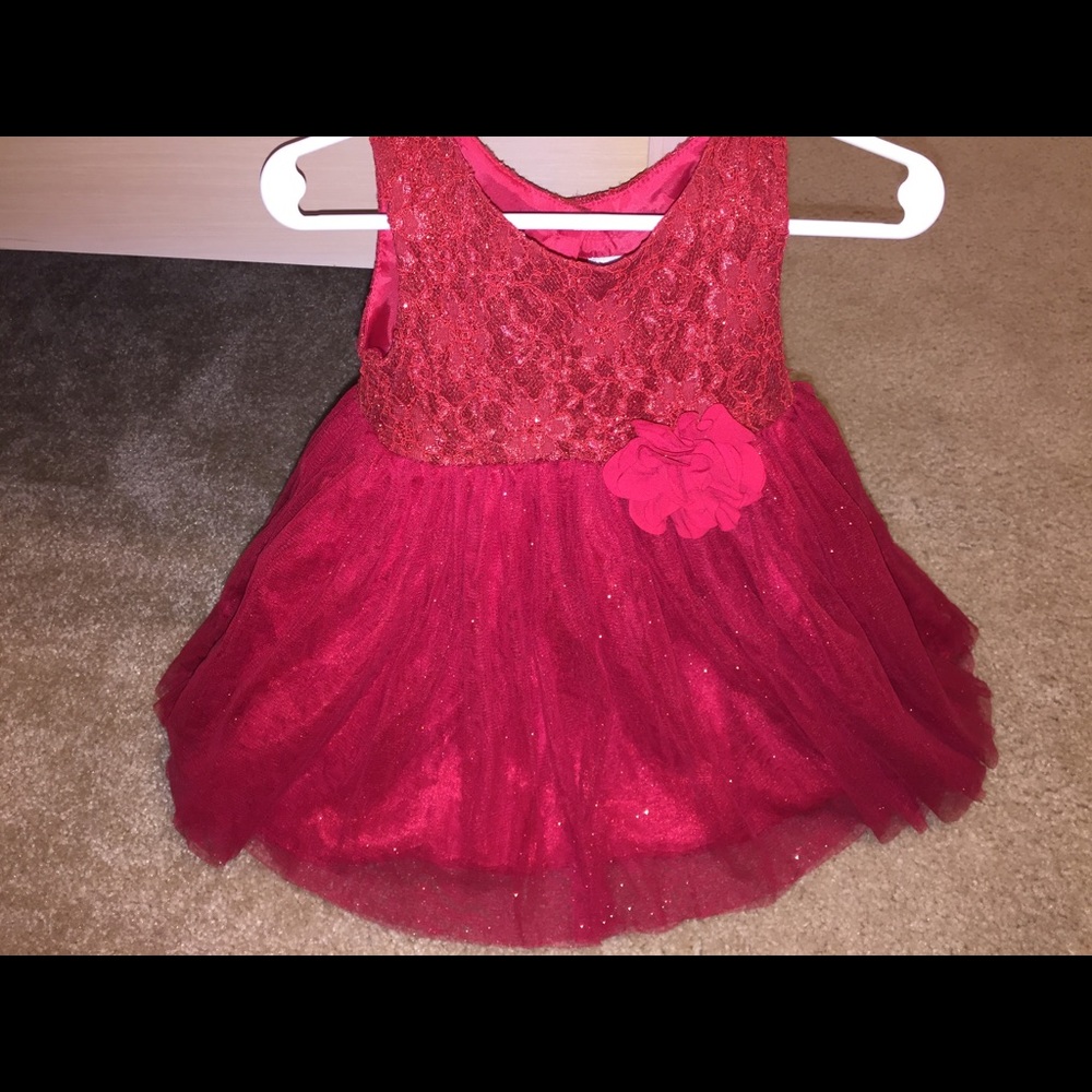 Red very shinny .! A girls dream dress